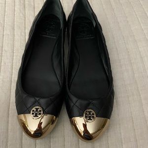 Black and gold Tory Burch